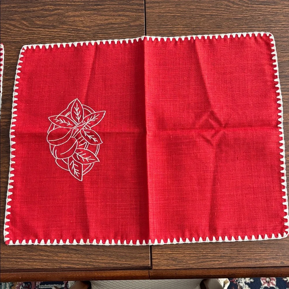2 embroidered placemats